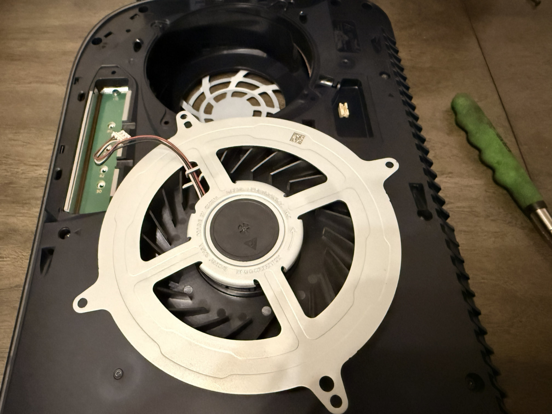 After — Replacement fan installed and properly secured. (PlayStation 5)